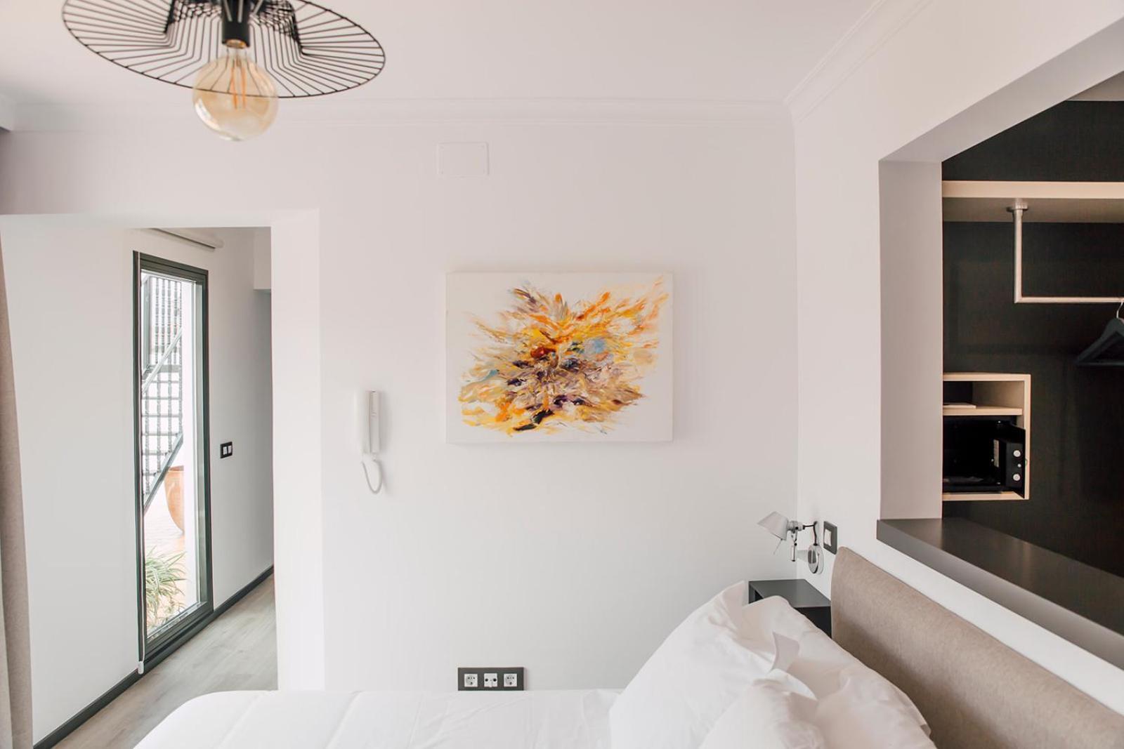 Puerta Catedral Holiday Suites Sevilha Quarto foto
