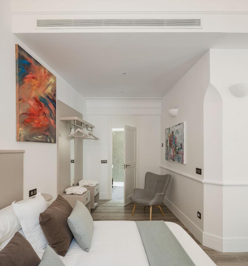Puerta Catedral Holiday Suites Sevilha Exterior foto